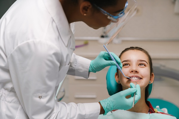 Should I Take My Child To A Kid Friendly Dentist In San Antonio For White Spots On Teeth?